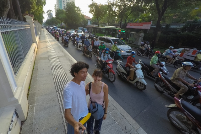 couple in busy street in Ho Chi Minh City